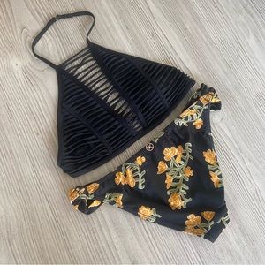 Sofia by Vix floral bikini bottoms and Black Victorias Secret halter top